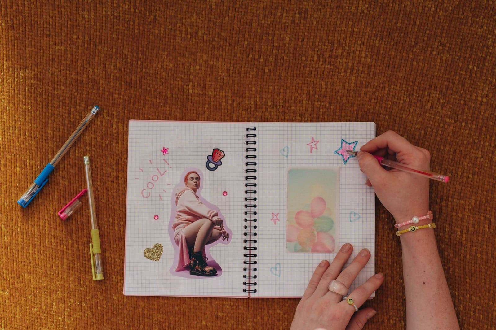 Colorful visual planner with bright sticky notes and organized columns spread across a desk