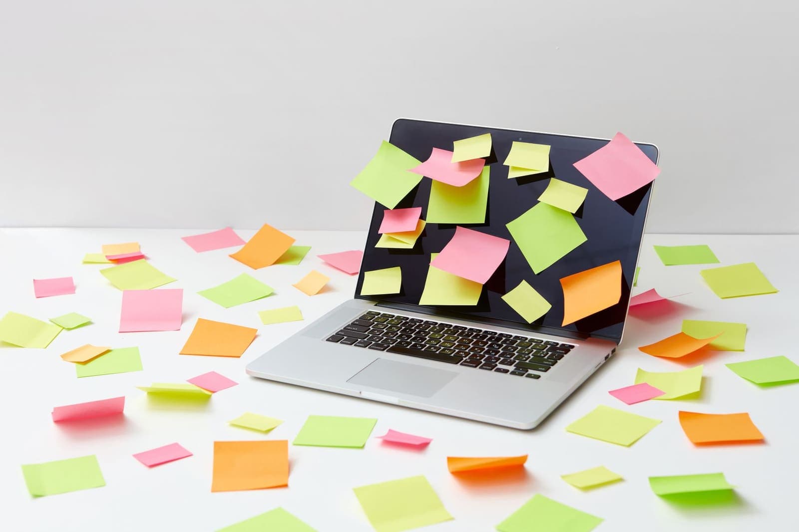 Colorful sticky notes arranged on a board to show task priorities