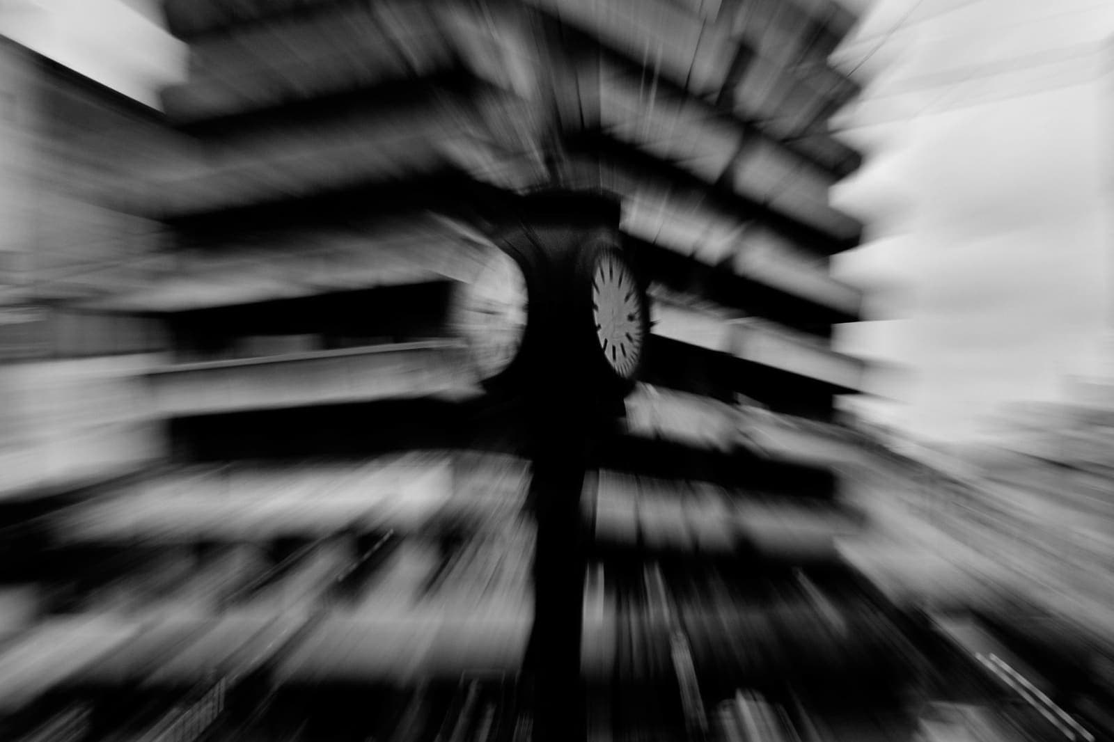 A clock with motion blur conveying the distorted feeling of time passing